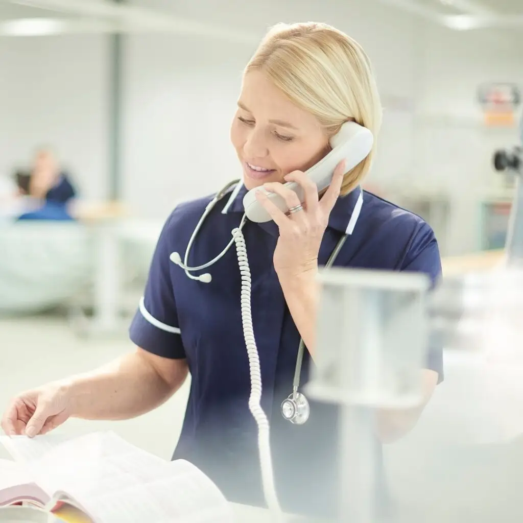 Healthcare professional contacting NHS 111 on behalf of a patient for medical assistance